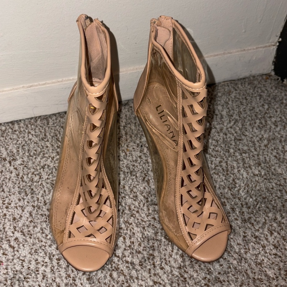 Liliana slightly used cut out clear high heels shoes.